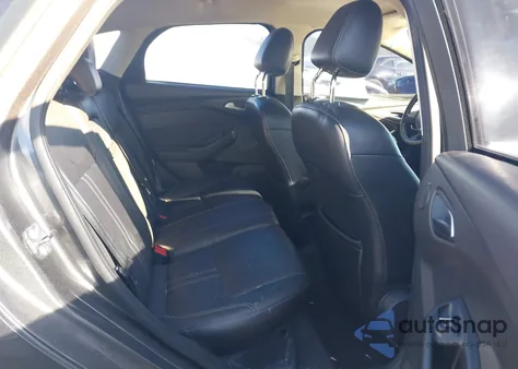 2012 Ford Focus Titanium z USA, uszkodzony, nr VIN 1FAHP3N25CL225033